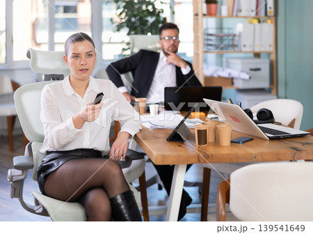 Employees of a company in the field of modern technology are sitting in the office Employees of a company in the field of modern technology are sitting in the office 139541649