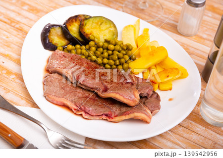 Roasted beef with potatoes 139542956