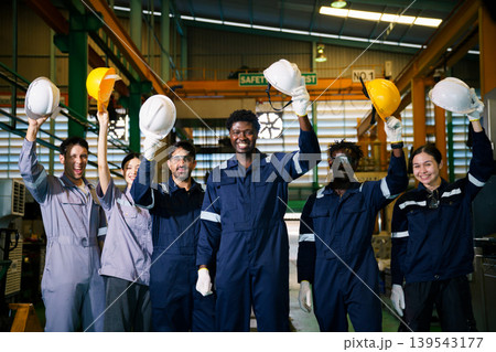 Diverse factory workers team portrait in industrial workplace 139543177