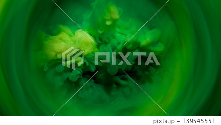 Blur ink splash. Mist art. Defocused green color glitter water round texture spreading on abstract creative acrylic vivid background. Blur ink splash. Mist art. Defocused green color glitter water round texture spreading on abstract creative acrylic vivid background. 139545551