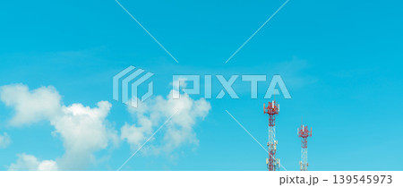 Telecommunication tower with blue sky and white clouds. Radio and satellite pole. Communication technology. Telecommunication industry. Mobile or telecom 4g and 5g network. Telecommunication pylon. Telecommunication tower with blue sky and white clouds. Radio and satellite pole. Communication technology. Telecommunication industry. Mobile or telecom 4g and 5g network. Telecommunication pylon. 139545973