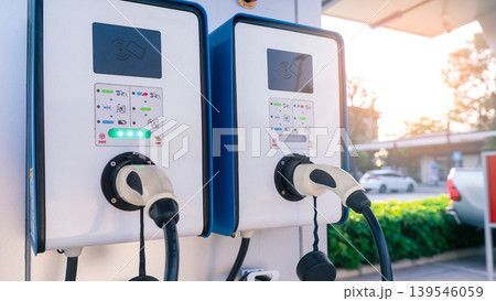 Electric car charging station for charge EV battery. Plug for vehicle with electric and hybrid engine. EV charger. Clean energy. Charging point for EV car. Green power. Future transport technology. Electric car charging station for charge EV battery. Plug for vehicle with electric and hybrid engine. EV charger. Clean energy. Charging point for EV car. Green power. Future transport technology. 139546059