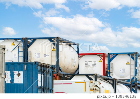 Chemical tank container. ISO tank container for chemical delivery. Bulk liquid transport. Chemical company. Container freight area. Global logistics business. Chemical container for truck transport. Chemical tank container. ISO tank container for chemical delivery. Bulk liquid transport. Chemical company. Container freight area. Global logistics business. Chemical container for truck transport. 139546138