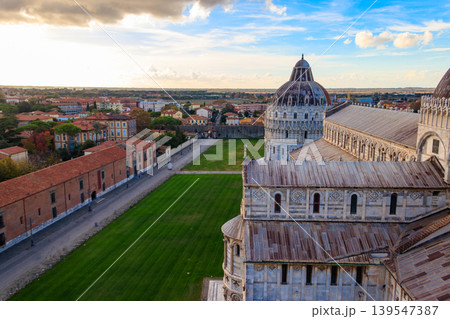 View of Pisa Cathedral (Cathedral of the Assumption of Mary) and the Pisa Baptistery of St. John from the Leaning tower in Pisa, Italy 139547387