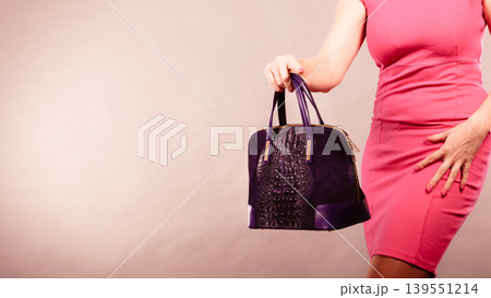 Elegant woman buyer with black bag. Elegant woman buyer with black bag. 139551214