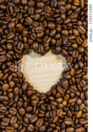 Roasted coffee beans with heart form Roasted coffee beans with heart form 139551489