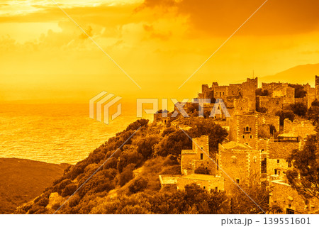 Tower houses in Vathia at sunset Greece Mani Peninsula Tower houses in Vathia at sunset Greece Mani Peninsula 139551601