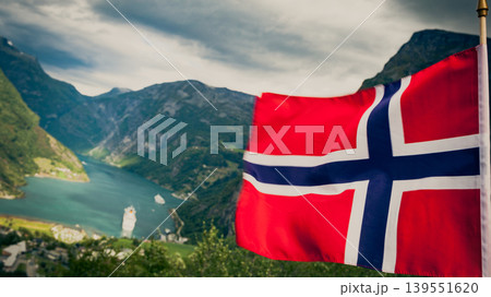 Norwegian flag and Geiranger fjord landscape 139551620
