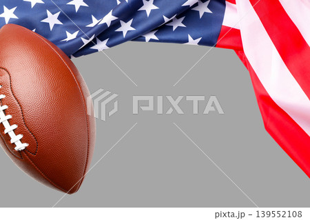 Football and USA flag mark Labor Day fun Football and USA flag mark Labor Day fun 139552108