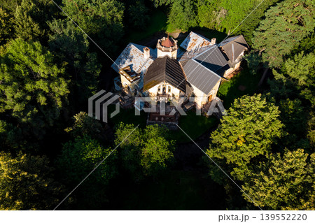 Landscape from above with a view of an old mansion among a green forest. Turliki Estate, Russia Landscape from above with a view of an old mansion among a green forest. Turliki Estate, Russia 139552220