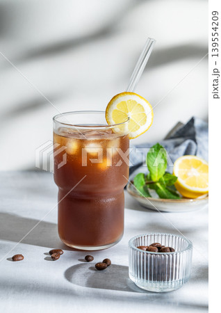 Cold Coffee Tonic Drink With Lemon and Ice Cold Coffee Tonic Drink With Lemon and Ice 139554209