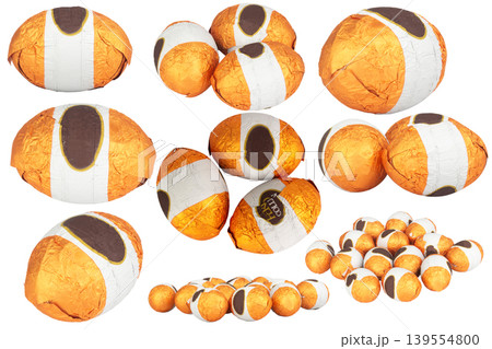 Chocolate balls wrapped in foil isolated on white background 139554800