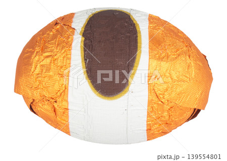 Chocolate balls wrapped in foil isolated on white background Chocolate balls wrapped in foil isolated on white background 139554801
