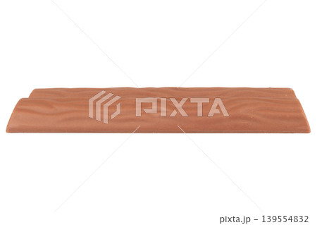 Long chocolate bar isolated on white background Long chocolate bar isolated on white background 139554832