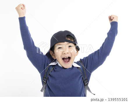 Excited Little boy wearing baseball cap isolated on white Excited Little boy wearing baseball cap isolated on white 139555101