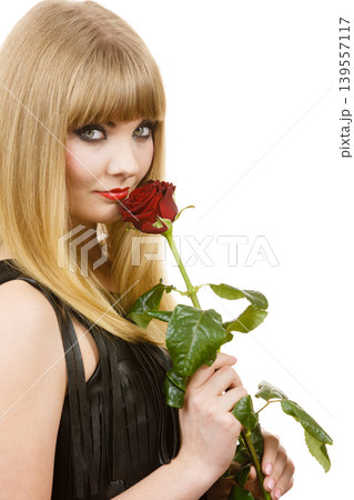 Beautiful young lady with red rose. Beautiful young lady with red rose. 139557117