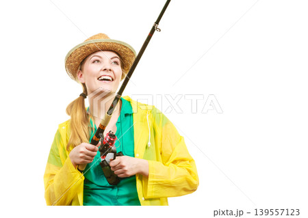 Woman with fishing rod, spinning equipment 139557123