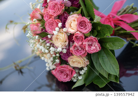 Bridal Rose Bouquet on Reflective Surface 139557942