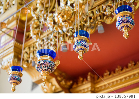 Ornate Hanging Oil Lamps Inside Church 139557991