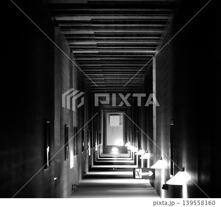 Abstract Symmetrical Corridor View With Strong Light Contrast Abstract Symmetrical Corridor View With Strong Light Contrast 139558160