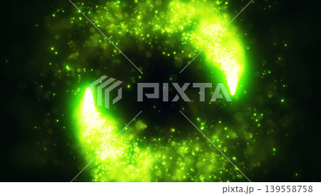Neon green particle glow creating a swirling circular frame with glittering bokeh on dark background and empty center copy space 139558758