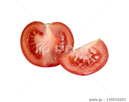 Tomato half and a slice displaying fresh pulp 139559203