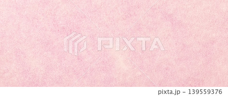 Light pink suede fabric background with matte microfiber texture, soft pastel rose felt surface, macro 139559376