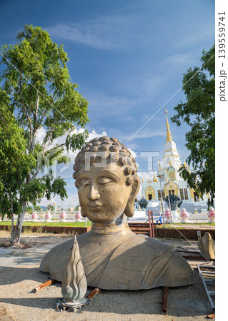 A part of unfinshed Buddha statue put on ground in Wat Saensuk Wisuthi Wararam, Buddhist temple in Bansaen, Chonburi, Thailand A part of unfinshed Buddha statue put on ground in Wat Saensuk Wisuthi Wararam, Buddhist temple in Bansaen, Chonburi, Thailand 139559741