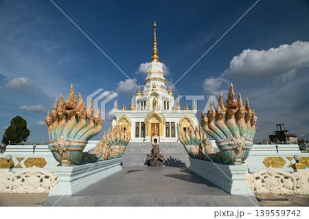 Wat Saensuk Wisuthi Wararam, Buddhist temple in Bansaen with multi heads Naga in shiny day, Chonburi, Thailand Wat Saensuk Wisuthi Wararam, Buddhist temple in Bansaen with multi heads Naga in shiny day, Chonburi, Thailand 139559742