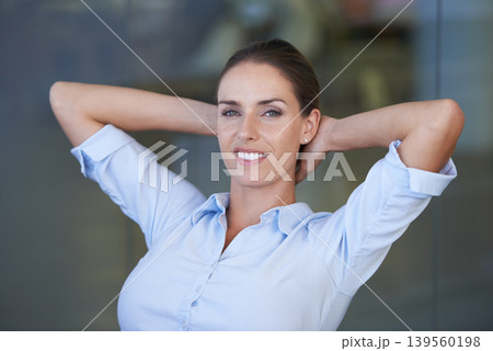 Woman, office and resting for work, portrait and hands on head for relaxing, satisfied and female person. Businesswoman, smiling and worker for job, workplace and finished with company projects 139560198