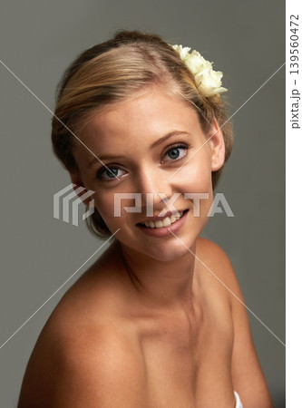 Portrait, skincare or woman with natural beauty, flower or wellness isolated on grey studio background. Face, person and model with texture, shine or cosmetic grooming with aesthetic and healthy skin Portrait, skincare or woman with natural beauty, flower or wellness isolated on grey studio background. Face, person and model with texture, shine or cosmetic grooming with aesthetic and healthy skin 139560472
