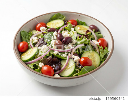 Fresh greek salad in a bowl with feta cheese olives cucumbers red onion side dish farm to table food photography cucumber vegetable mediterranean appetizer vegetarian restaurant ingredients Fresh greek salad in a bowl with feta cheese olives cucumbers red onion side dish farm to table food photography cucumber vegetable mediterranean appetizer vegetarian restaurant ingredients 139560541