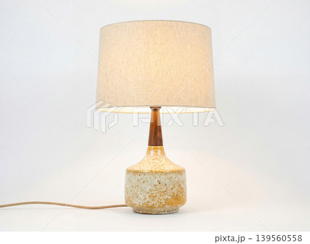 Decorative table lamp with a textured ceramic base and fabric shade high tech kidney bean lighting decorative interior appliance business chandelier contemporary creative entertainment Decorative table lamp with a textured ceramic base and fabric shade high tech kidney bean lighting decorative interior appliance business chandelier contemporary creative entertainment 139560558