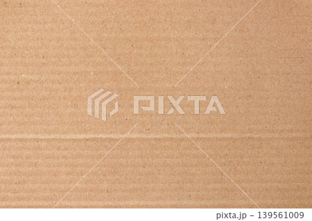 Brown cardboard sheet abstract background, texture of recycle paper box in old vintage pattern for design art work. Brown cardboard sheet abstract background, texture of recycle paper box in old vintage pattern for design art work. 139561009