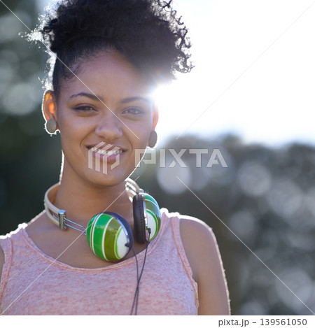 Portrait, student or happy woman at park with headphones at university campus outdoor in nature. Face, college and smile of girl or young person in education for learning to study at school in Brazil Portrait, student or happy woman at park with headphones at university campus outdoor in nature. Face, college and smile of girl or young person in education for learning to study at school in Brazil 139561050