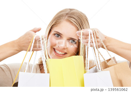 Portrait, woman and shopping bag in studio for retail sales, financial freedom or commerce savings from market white background. Face of happy customer with gift bags for deal, discount and promotion 139561062