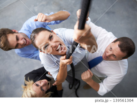 Office, people and woman climbing rope with effort, motivation and staff trust in team member for agency growth. Community, top view and professional person with determination, support and commitment Office, people and woman climbing rope with effort, motivation and staff trust in team member for agency growth. Community, top view and professional person with determination, support and commitment 139561304