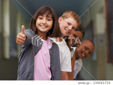 Children, student and thumbs up at school for learning success, education achievement and thank you. Group portrait of kids and girl with like, yes and vote or feedback for knowledge and support Children, student and thumbs up at school for learning success, education achievement and thank you. Group portrait of kids and girl with like, yes and vote or feedback for knowledge and support 139561719