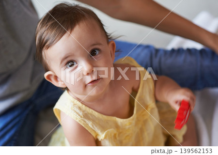 Baby, portrait and toys in living room floor, bonding and sensory growth in family home. Motherhood, girl and play with child development for games, childhood or fun with love, cognition or kids Baby, portrait and toys in living room floor, bonding and sensory growth in family home. Motherhood, girl and play with child development for games, childhood or fun with love, cognition or kids 139562153