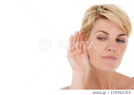 Ear, hand and woman with secret in a studio with mockup space for advertising or marketing. Gossip, communication and female person with listening gesture isolated by white background with mock up. Ear, hand and woman with secret in a studio with mockup space for advertising or marketing. Gossip, communication and female person with listening gesture isolated by white background with mock up. 139562203