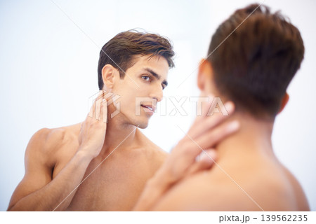Man, mirror and thinking on skincare and beauty in bathroom, cosmetics and dermatology or facial treatment. Male person, reflection and grooming in morning routine, hygiene and wellness or care Man, mirror and thinking on skincare and beauty in bathroom, cosmetics and dermatology or facial treatment. Male person, reflection and grooming in morning routine, hygiene and wellness or care 139562235
