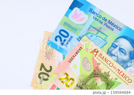Variety of Mexican currency, including 20 pesos MXN banknotes bills Variety of Mexican currency, including 20 pesos MXN banknotes bills 139564084