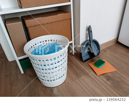 Household cleaning supplies and cardboard boxes for moving Household cleaning supplies and cardboard boxes for moving 139564252