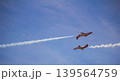 Crossing Paths Above the Clouds 139564759