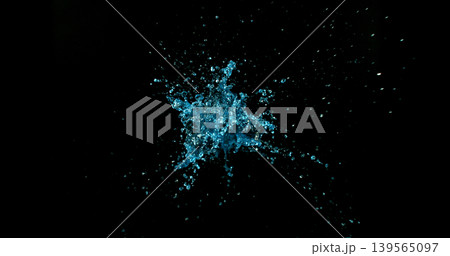 Dynamic water splash explosion isolated on black background with realistic liquid droplets for VFX overlay and cinematic visual effects Dynamic water splash explosion isolated on black background with realistic liquid droplets for VFX overlay and cinematic visual effects 139565097