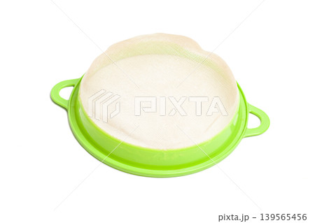 Plastic sieve isolated on white. Cooking utensil. 139565456
