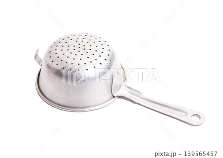 Aluminum colander isolated on white. Cooking utensil. Aluminum colander isolated on white. Cooking utensil. 139565457