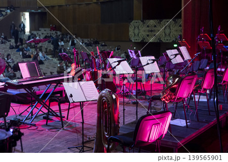 The orchestra's musical instruments are laid out on their workbenches, prepared before the concert. The orchestra's musical instruments are laid out on their workbenches, prepared before the concert. 139565901