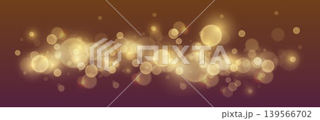 Golden bokeh lights creating a festive glowing abstract background 139566702
