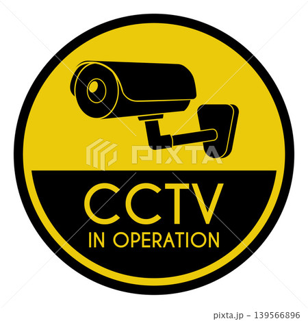 A video camera on a yellow round warning sign with the text "CCTV in Operation." 139566896